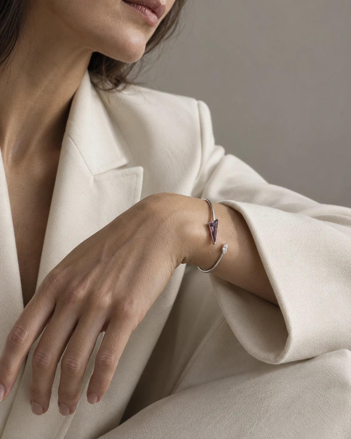 Concept lilac triangular-stone cuff worn with ivory tailoring