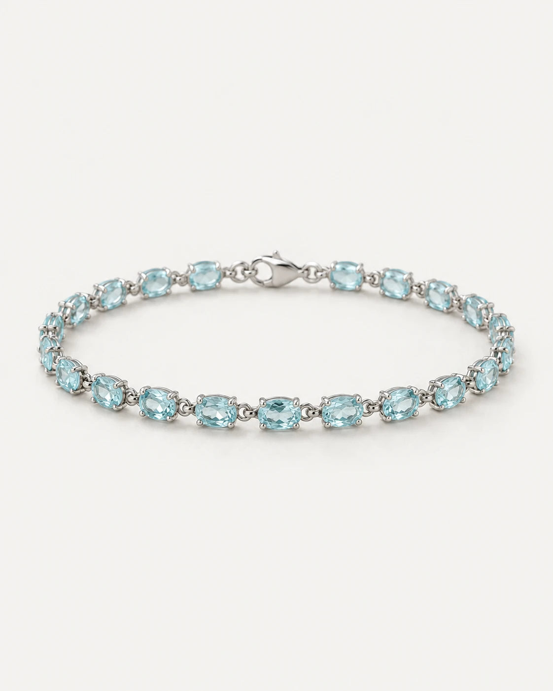 Aqua Rhythm Bracelet. Repeating horizontal oval centers.