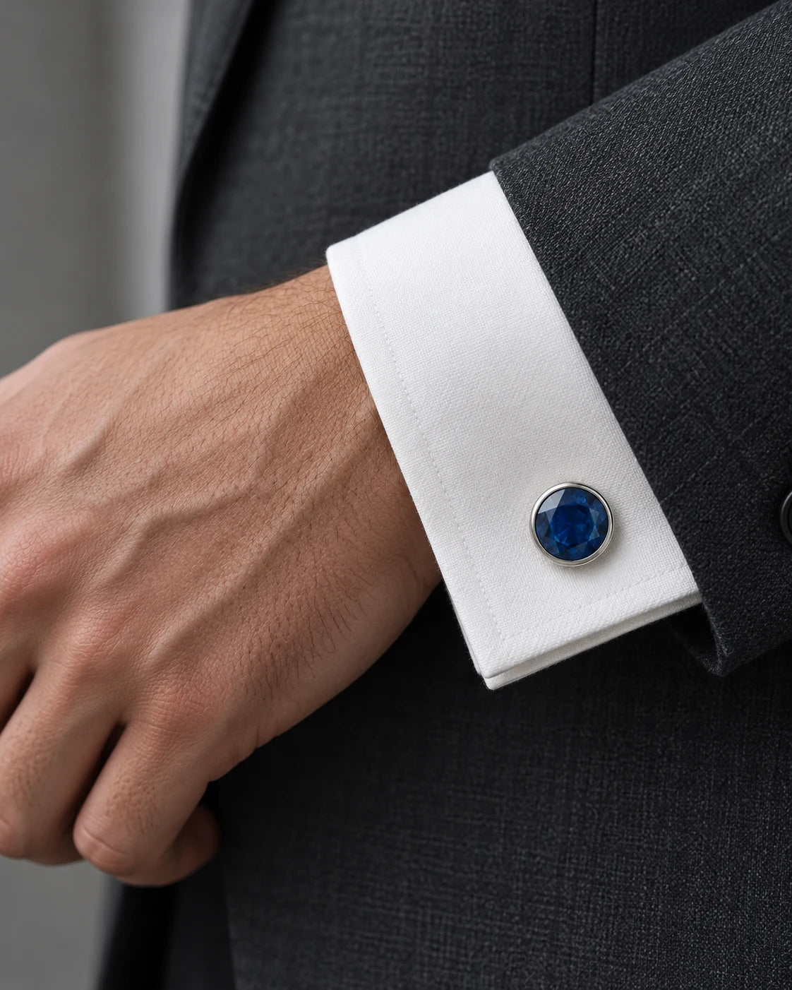 AI concept: Blue Disc Cufflinks, wearing study