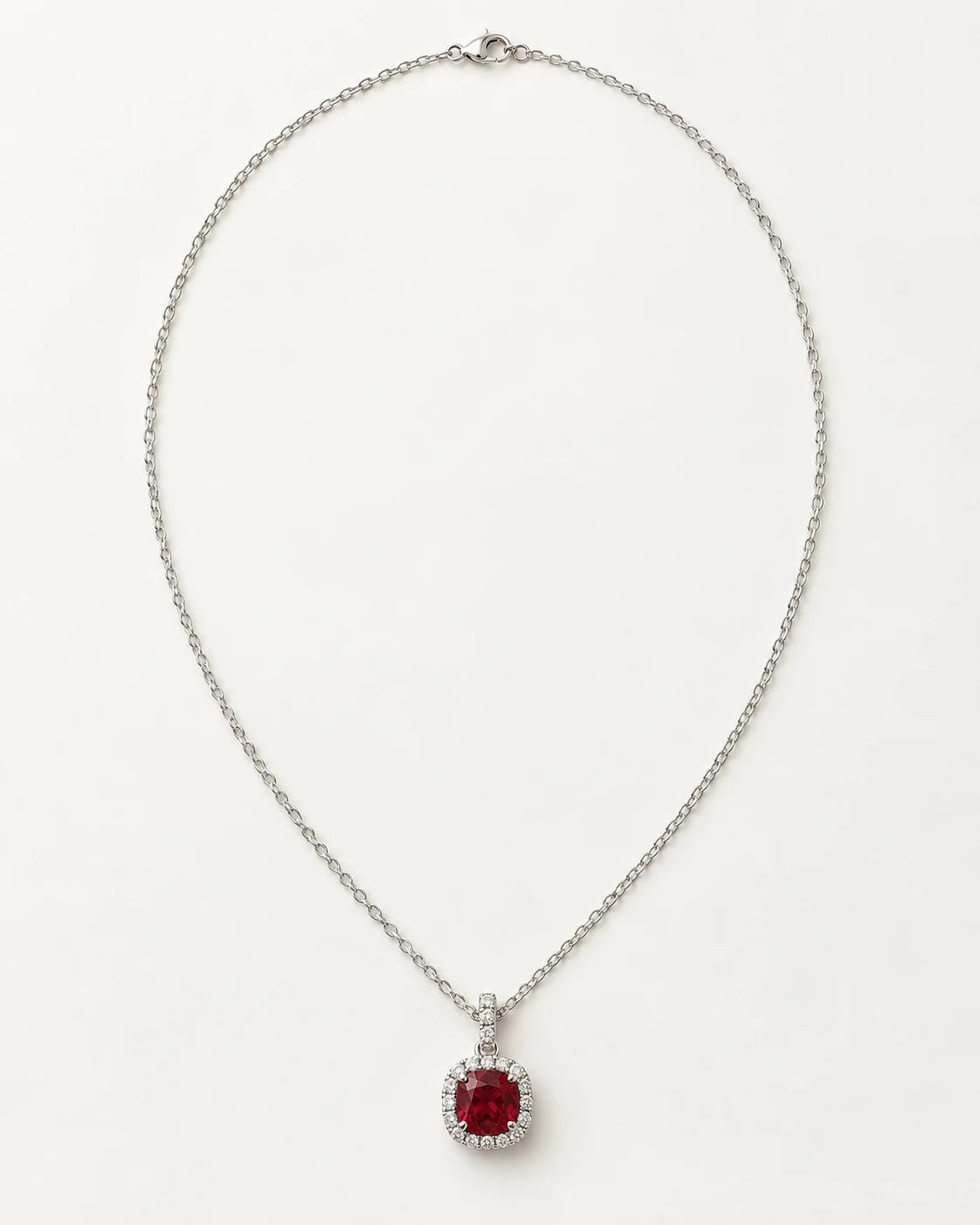 Red cushion-stone halo pendant concept